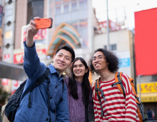 Tourists in Japan taking a selfie